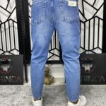 Açık Mavi Bol Yırtmaçlı Boyfriend Kalıp Kot Pantolon W.K-100696